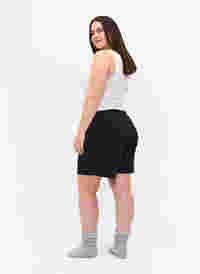 Lösa shorts i tyg med struktur, Black, Model