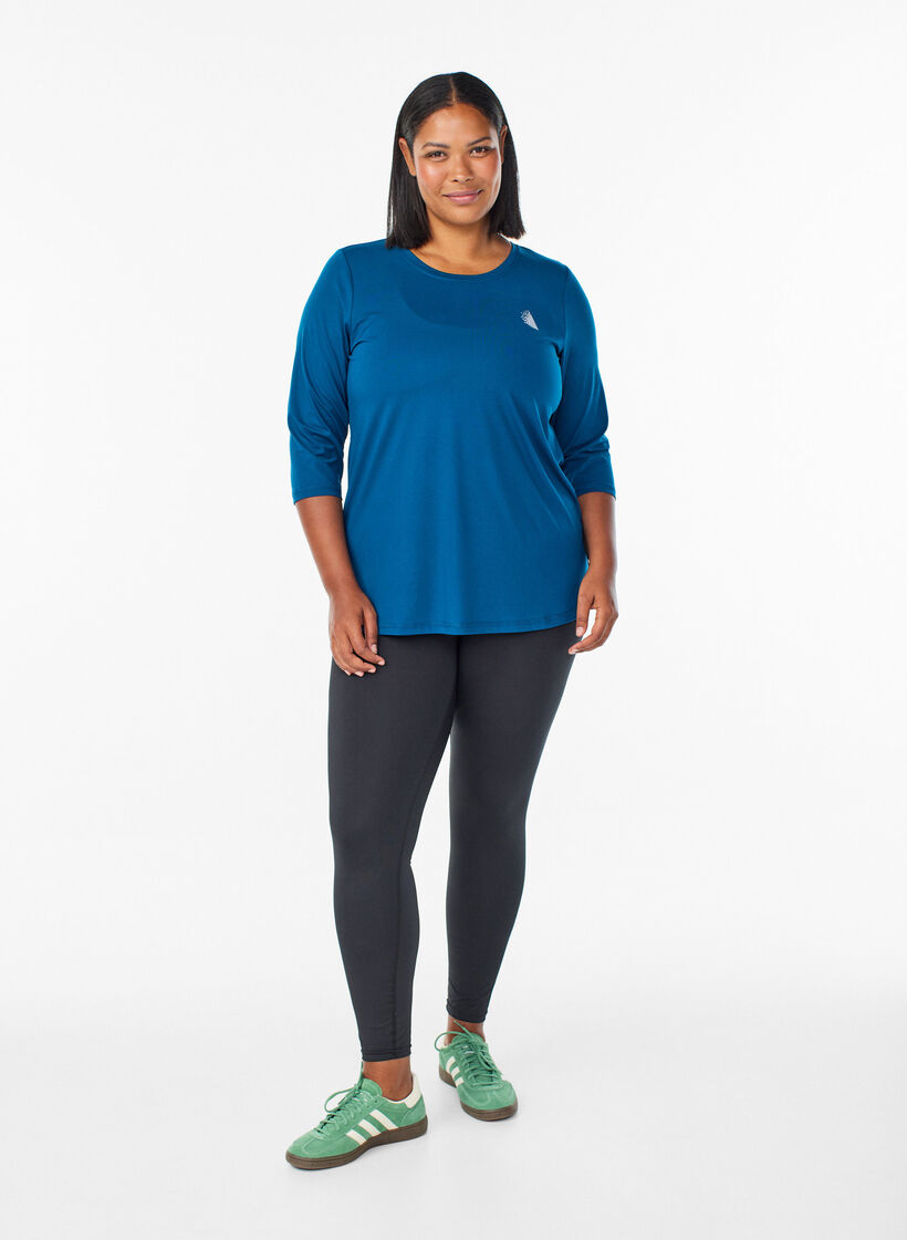 Tr&auml;ningsblus med trekvarts&auml;rm, Bl&aring;, Model image number 1