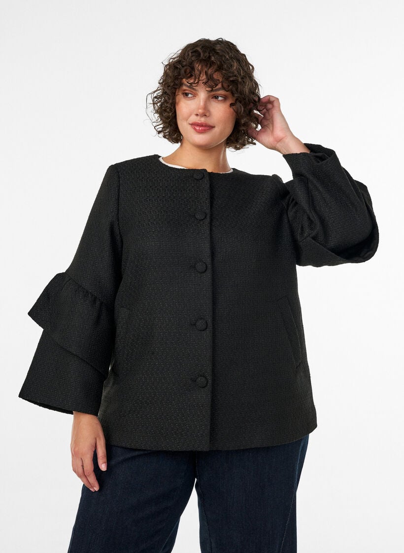 Jacka i boucl&eacute; med volangdetaljer, Svart, Model image number 0