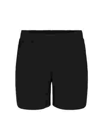Lösa shorts i tyg med struktur