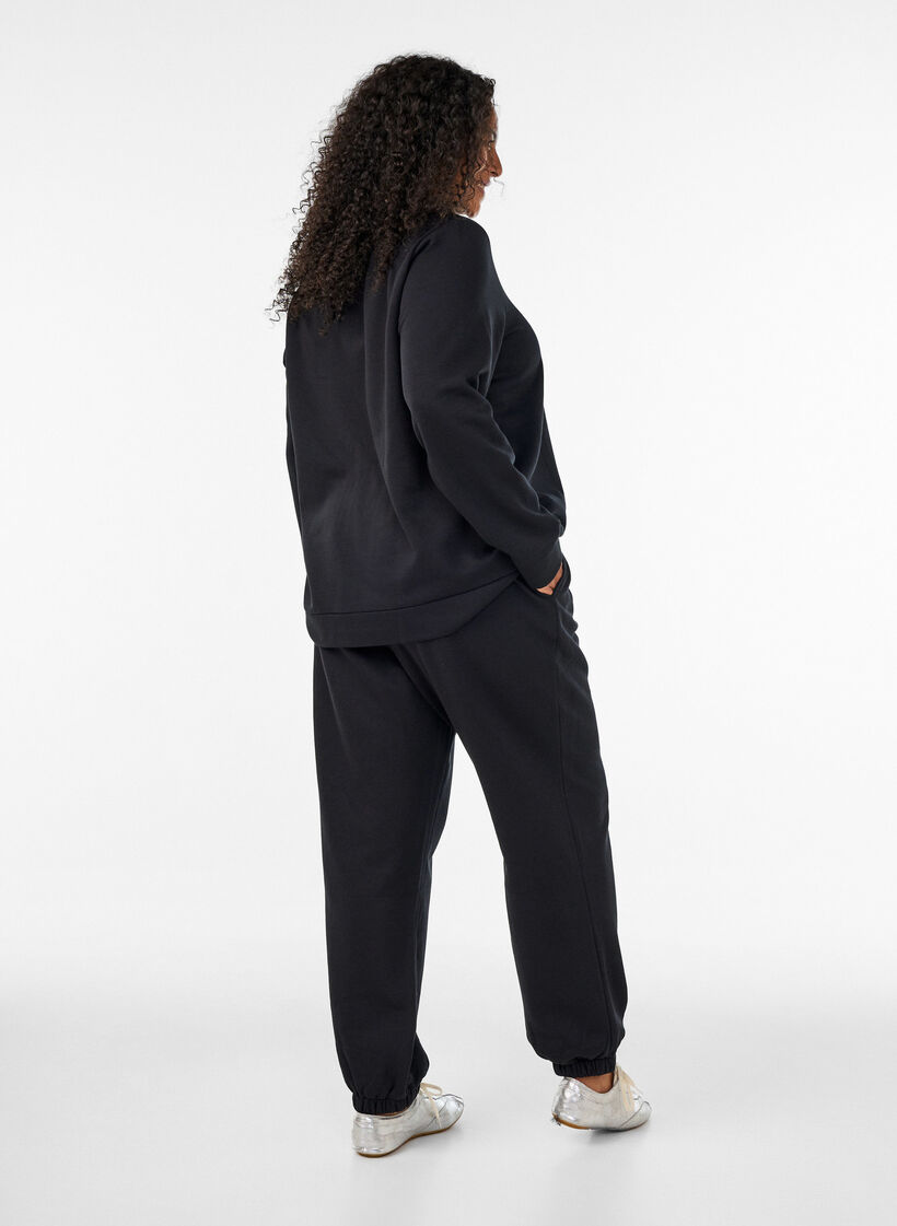 Mjukisbyxor med h&ouml;g midja och dragsko, Svart, Model image number 1