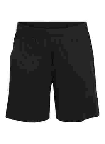 Lösa shorts med fickor