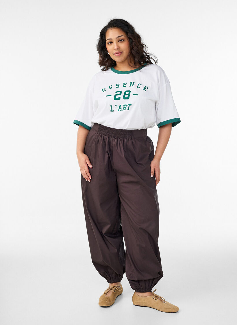 T-shirt i bomull med texttryck och boxig passform, Vit, Model image number 1