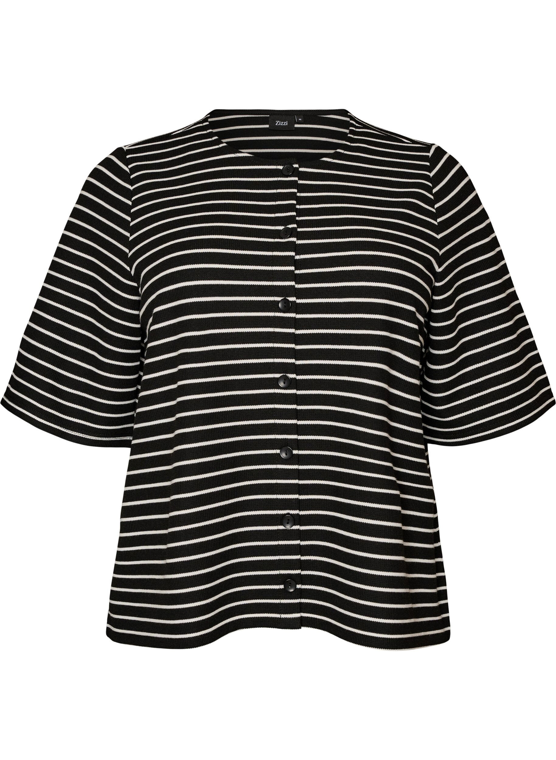 Blus med ribbad struktur och kn&auml;ppning