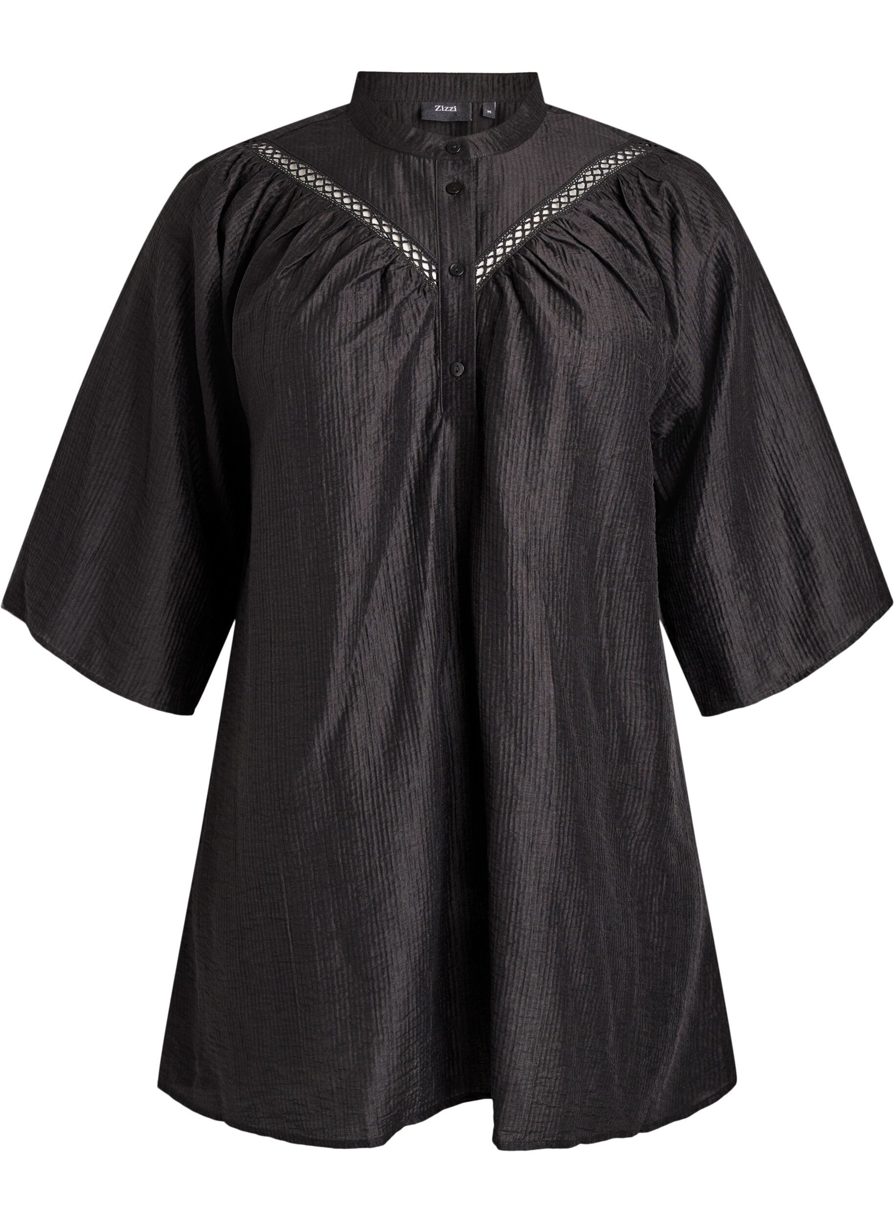 Tunika med virkade detaljer och randig textur