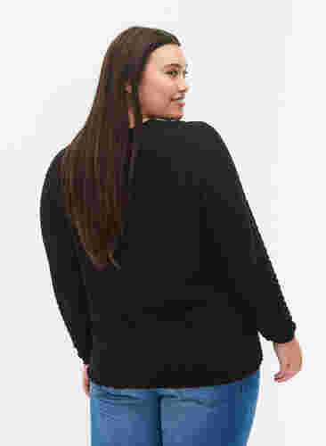 Stickad tröja med mönster och v-ringad hals, Black, Model image number 1