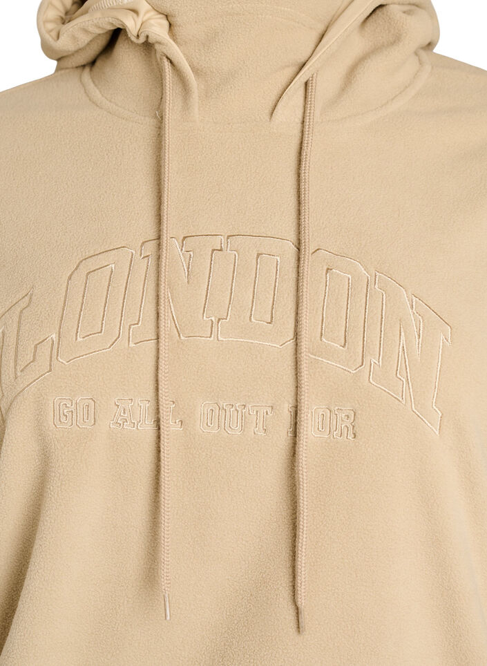 Huvtr&ouml;ja i fleece med h&ouml;g hals och broderad text, Beige, Packshot image number 2