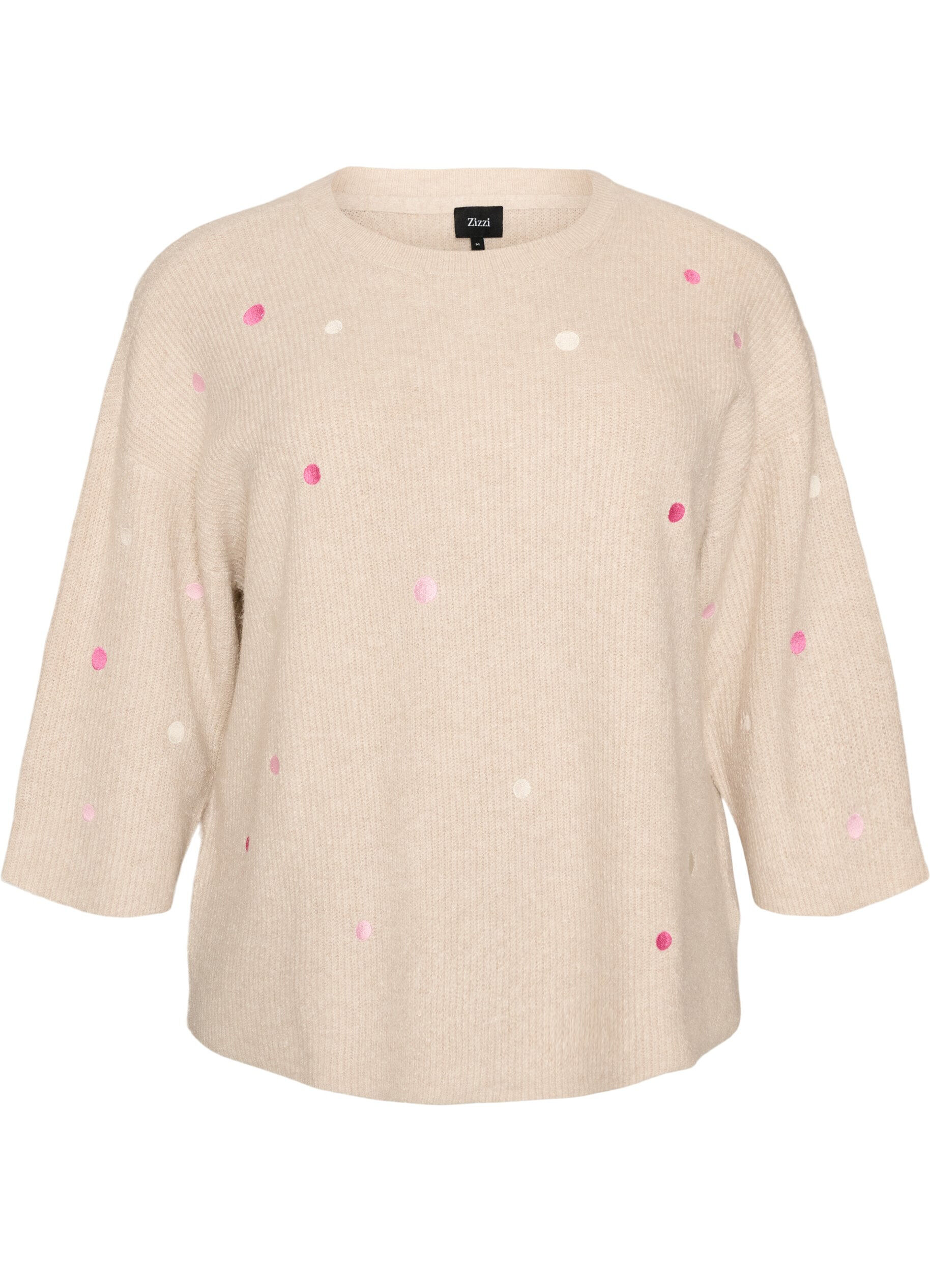 Stickad blus med sm&aring; broderade motiv