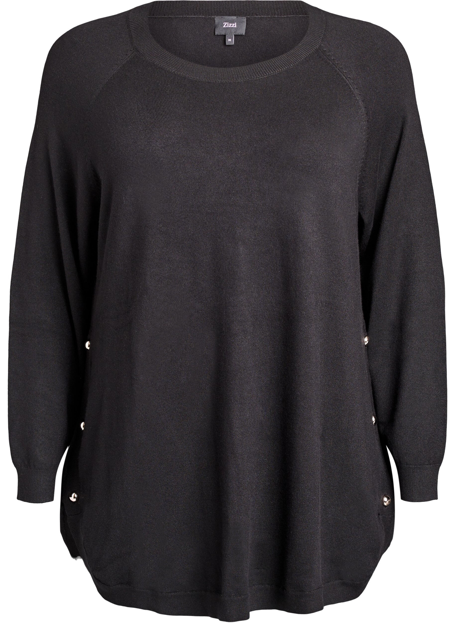 Stickad blus med knappar i sidan