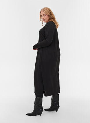 Enfärgad klänning med långa ärmar och slits, Black, Model image number 1