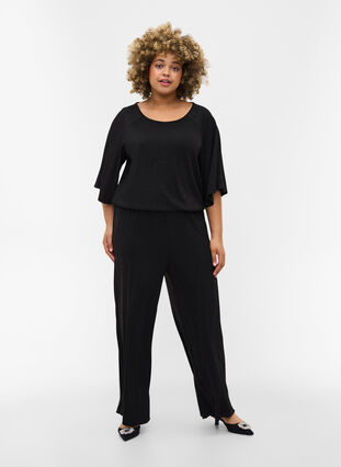 Kortärmad jumpsuit med glitter, Black, Model image number 0