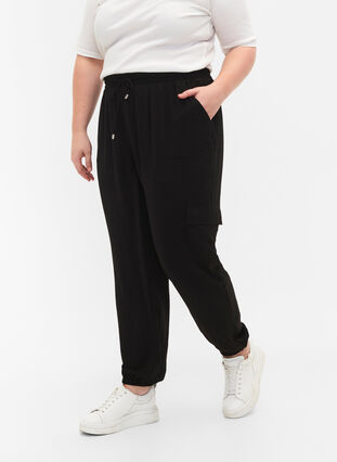 Enfärgade byxor med stora fickor, Black, Model image number 2