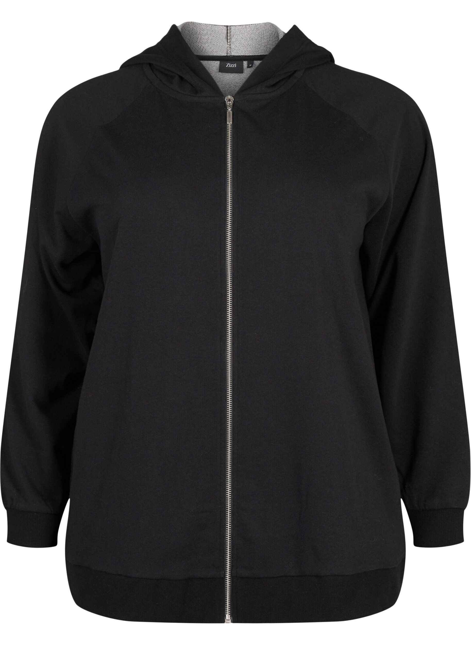 Kofta i sweatshirt material med huva och fickor