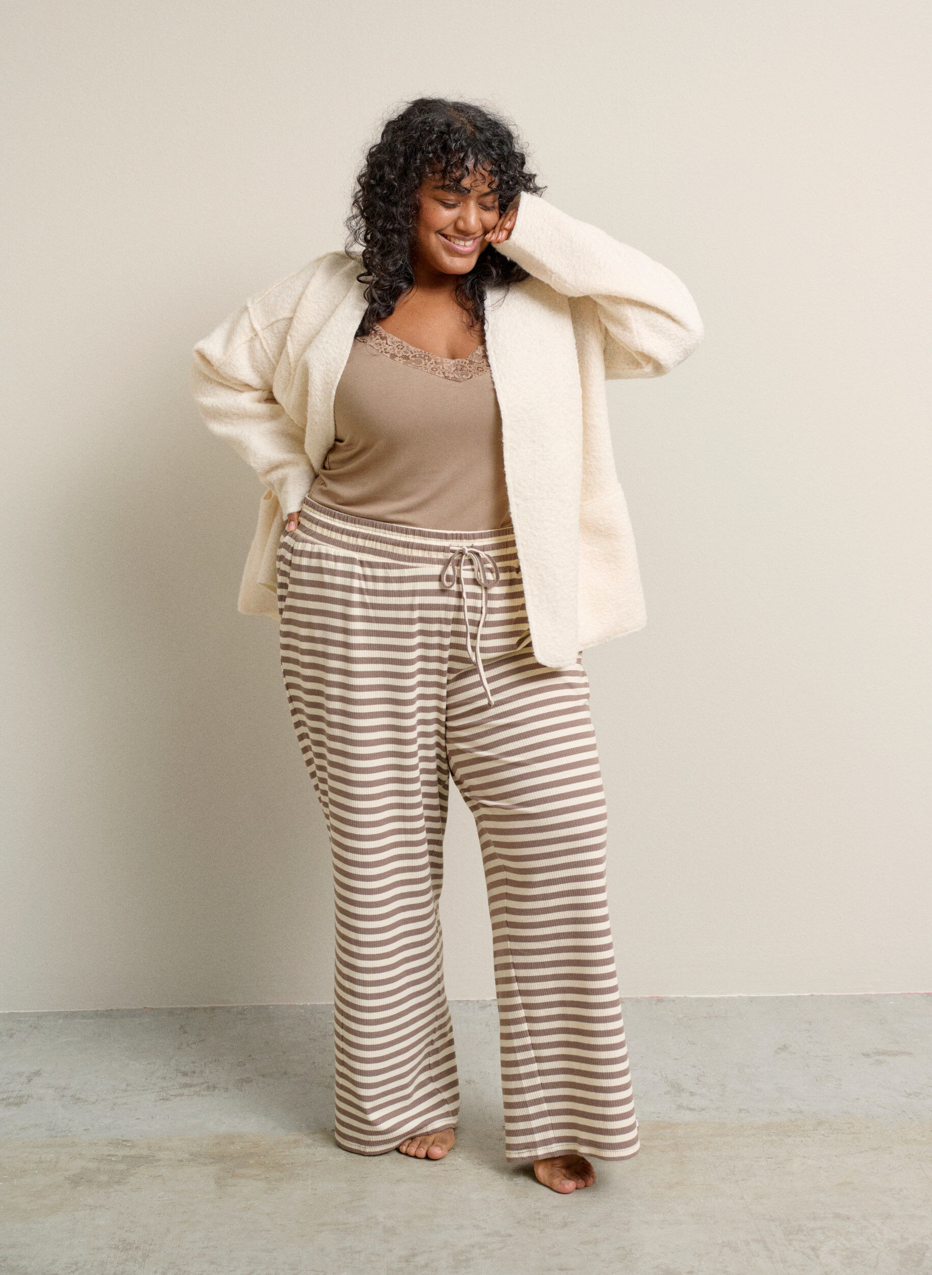 L&ouml;s kofta med fickor