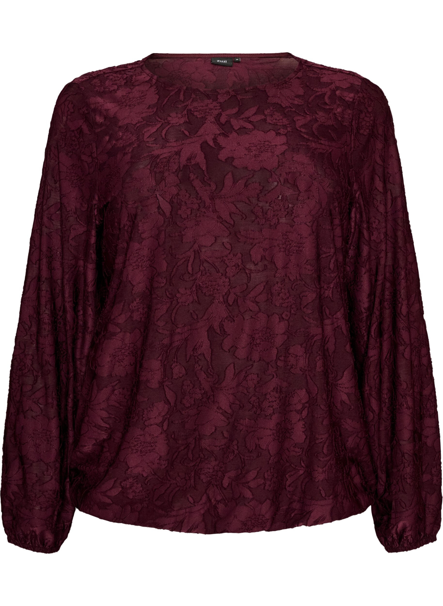 Skir blus med blommig textur och l&aring;nga &auml;rmar