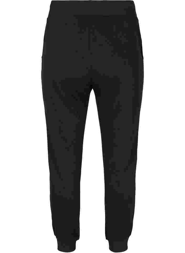 Enfärgade träningsbyxor med fickor, Black, Packshot image number 1