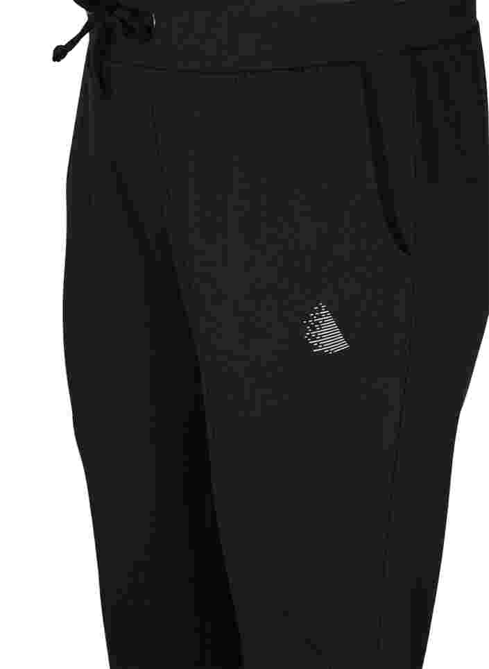 Enfärgade träningsbyxor med fickor, Black, Packshot image number 2