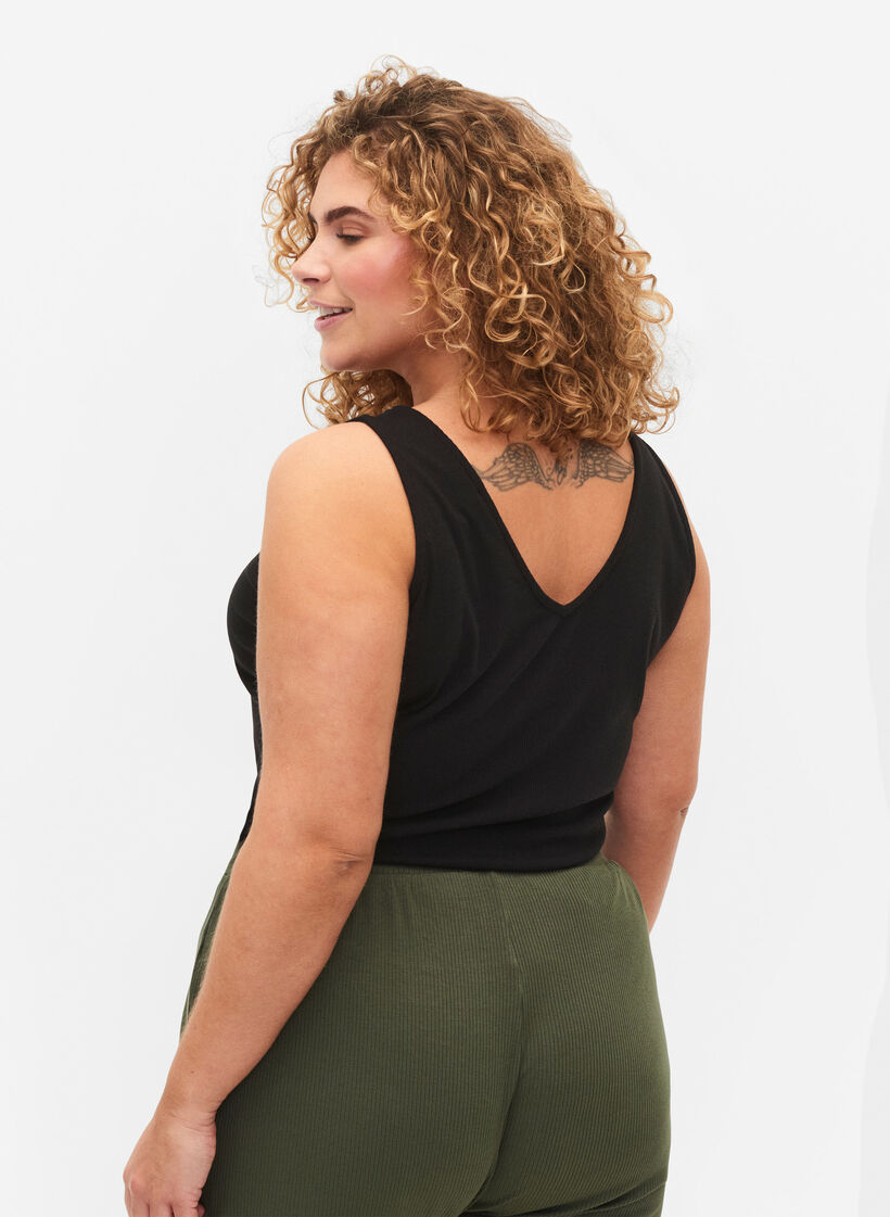 V-ringad bas-topp i ribbat material, Black, Model image number 1