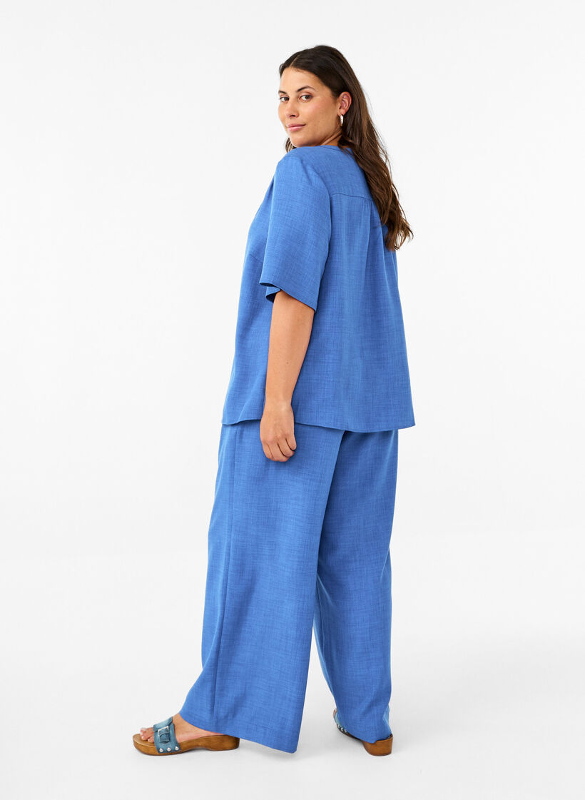 L&ouml;sa byxor med res&aring;r i midjan och fickor, Bl&aring;, Model image number 1