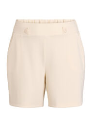 Shorts med fickor och l&ouml;s passform, Beige
