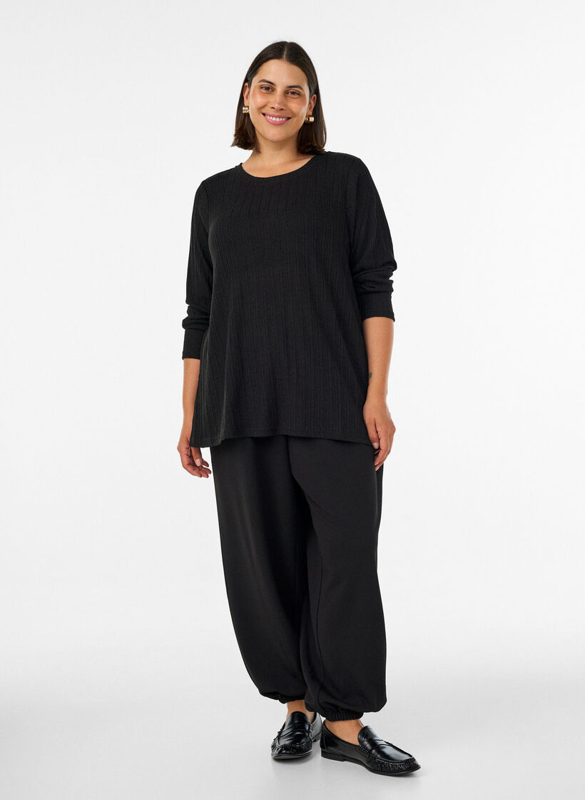 Jerseyblus med ribbstruktur och l&aring;nga &auml;rmar, Svart, Model image number 1