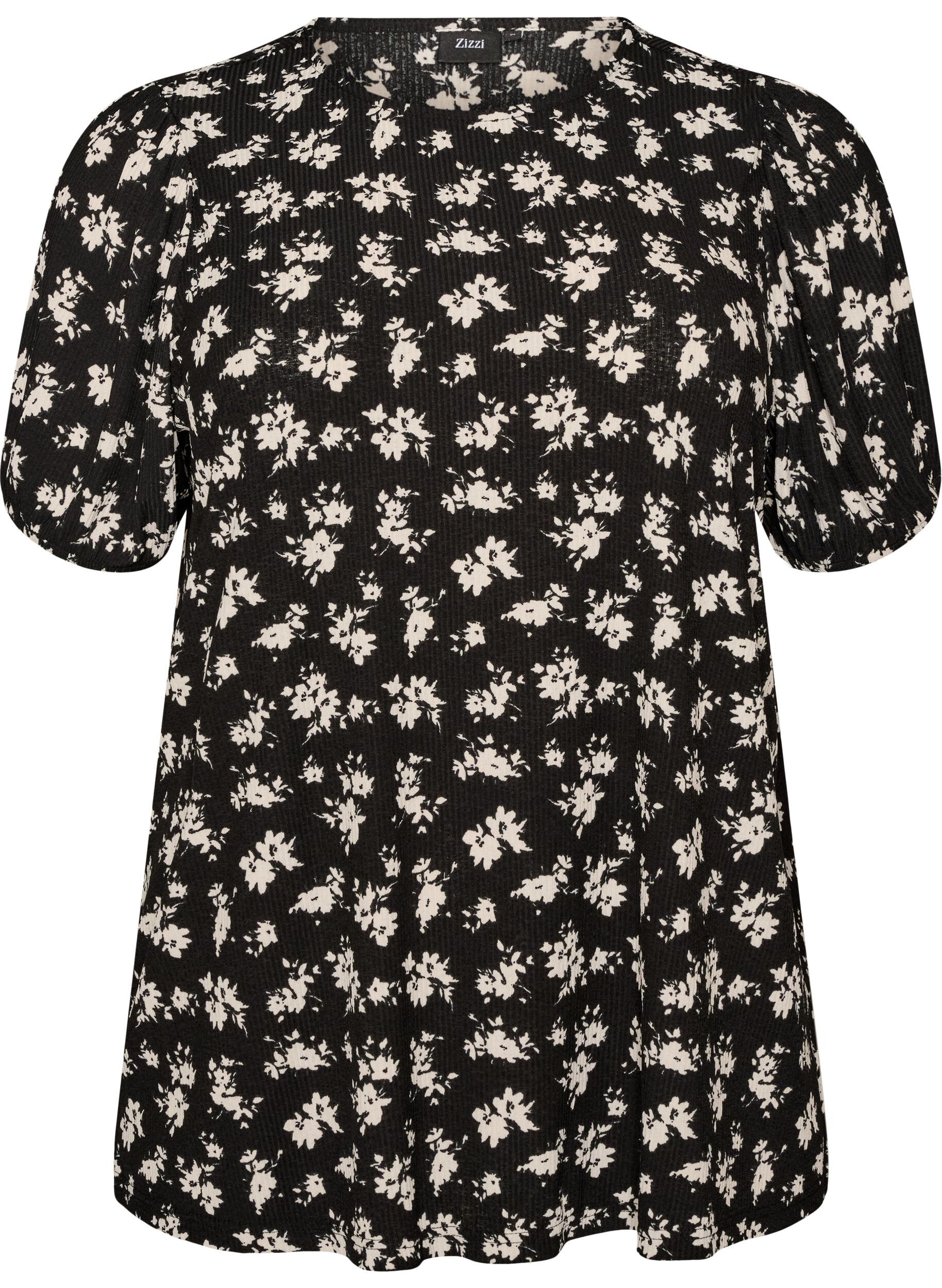 Blus med l&aring;nga &auml;rmar och blommigt tryck