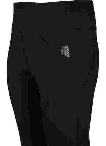 Träningstights med reflex och inre fleece, Black, Packshot image number 2
