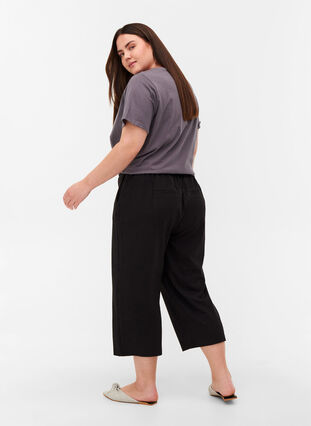 Enfärgade culottebyxor med fickor, Black, Model image number 1