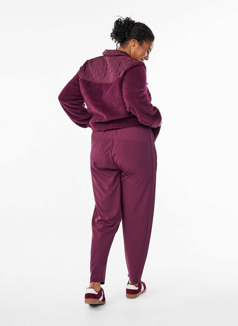 L&auml;ttviktstr&auml;ningsbyxor med fickor, R&ouml;d, Model image number 1