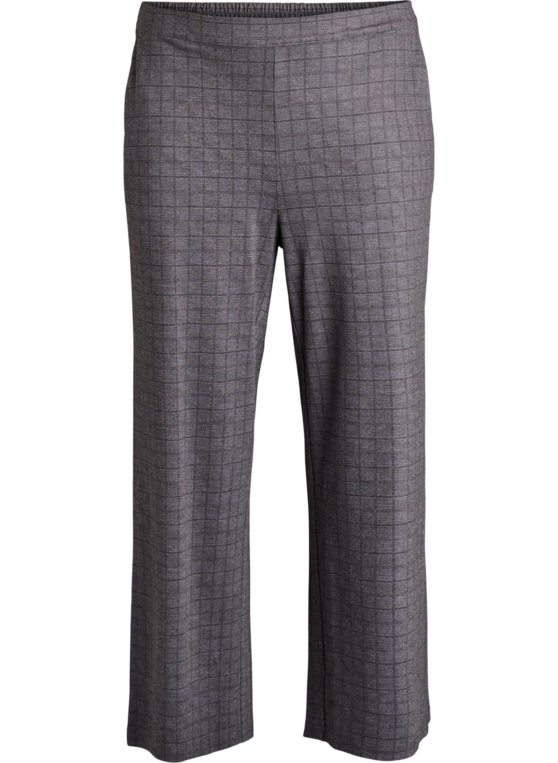 Rutiga byxor med vida ben