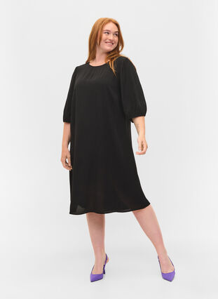 Viskosklänning med ryggdetalj, Black, Model image number 3