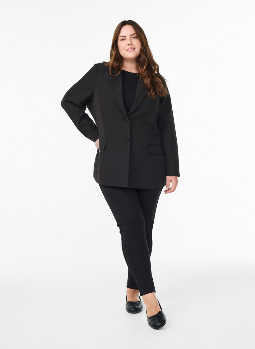 Leggings med glitterrand och slitsar, Svart, Model image number 1