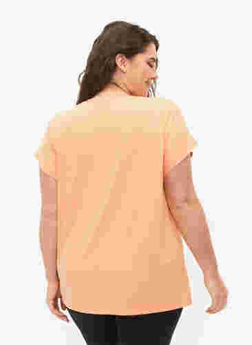 Kortärmad t-shirt för träning, Apricot Nectar, Model image number 1