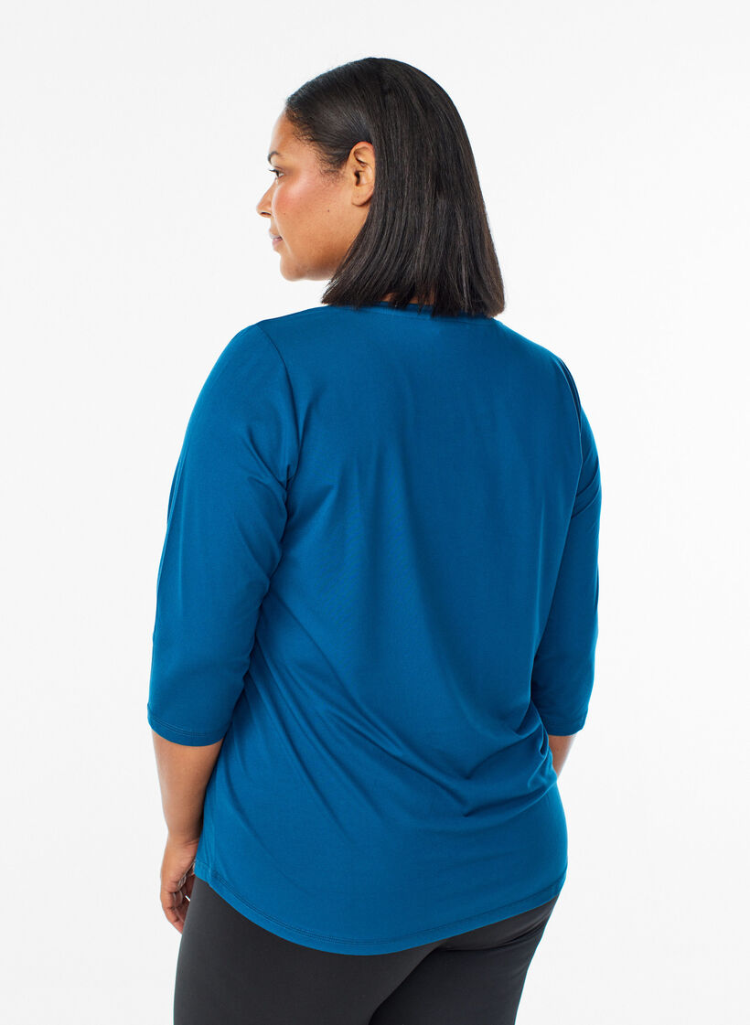 Tr&auml;ningsblus med trekvarts&auml;rm, Bl&aring;, Model image number 2