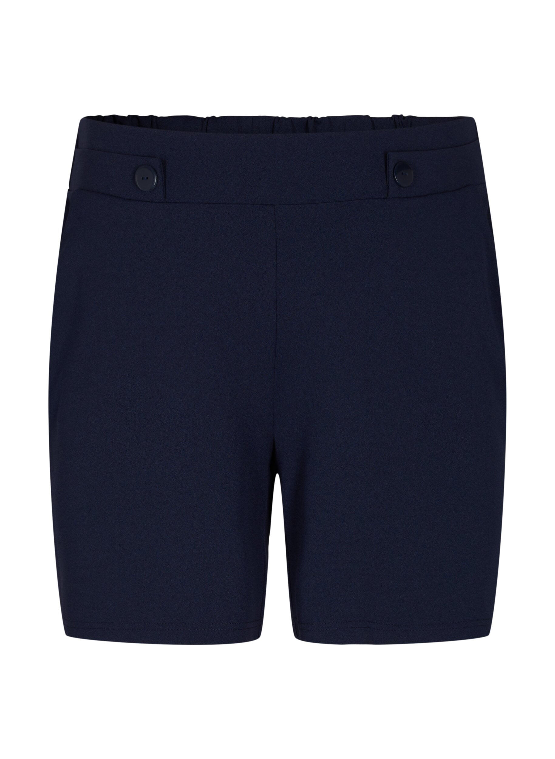 Shorts med fickor och l&ouml;s passform