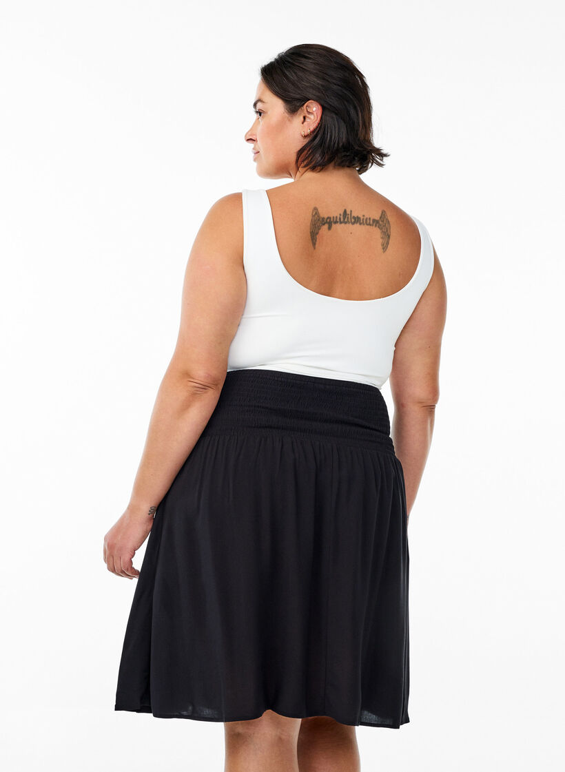 Kort kjol med smock i midjan, Svart, Model image number 2