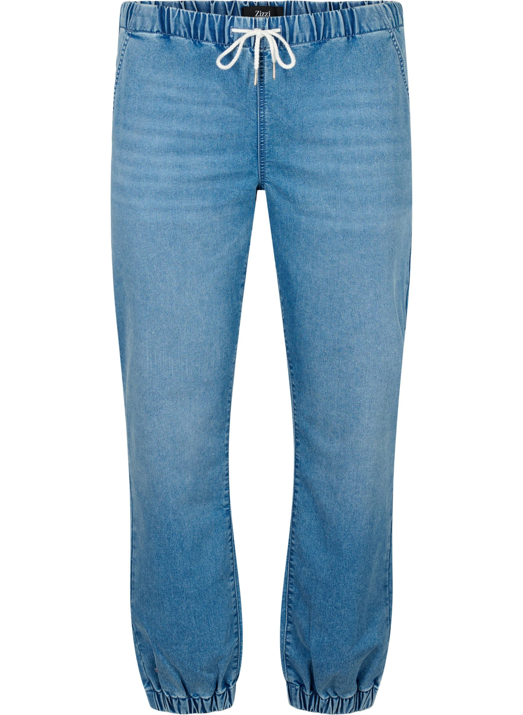 Joggingbyxor i denim med fickor