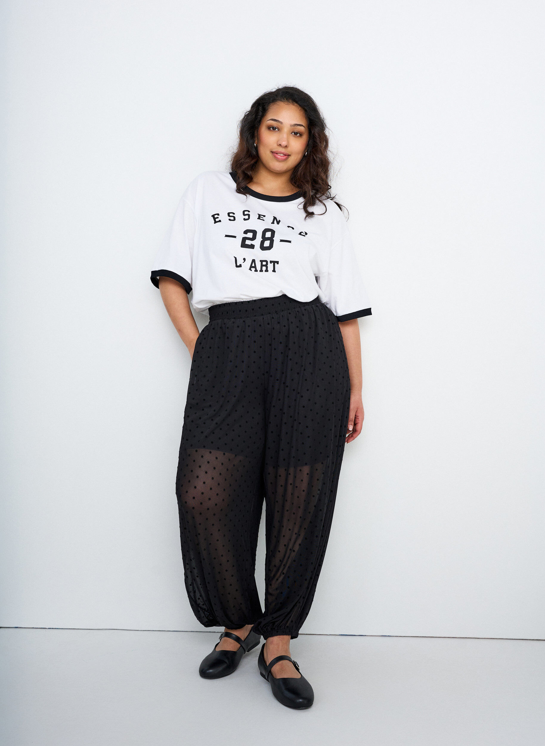 T-shirt i bomull med texttryck och boxig passform