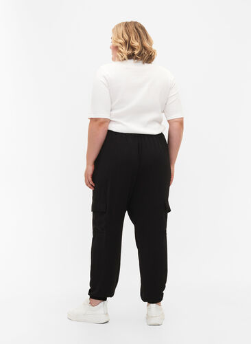 Enfärgade byxor med stora fickor, Black, Model image number 1