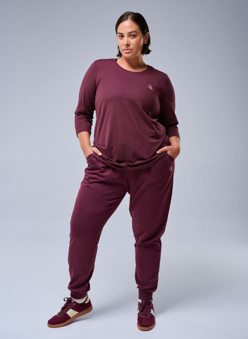 L&ouml;st sittande tr&auml;ningsbyxor med fickor, Gr&ouml;n, Image image number 0