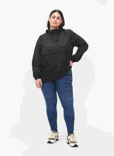 Anorak med huva och ficka, Black, Model image number 1