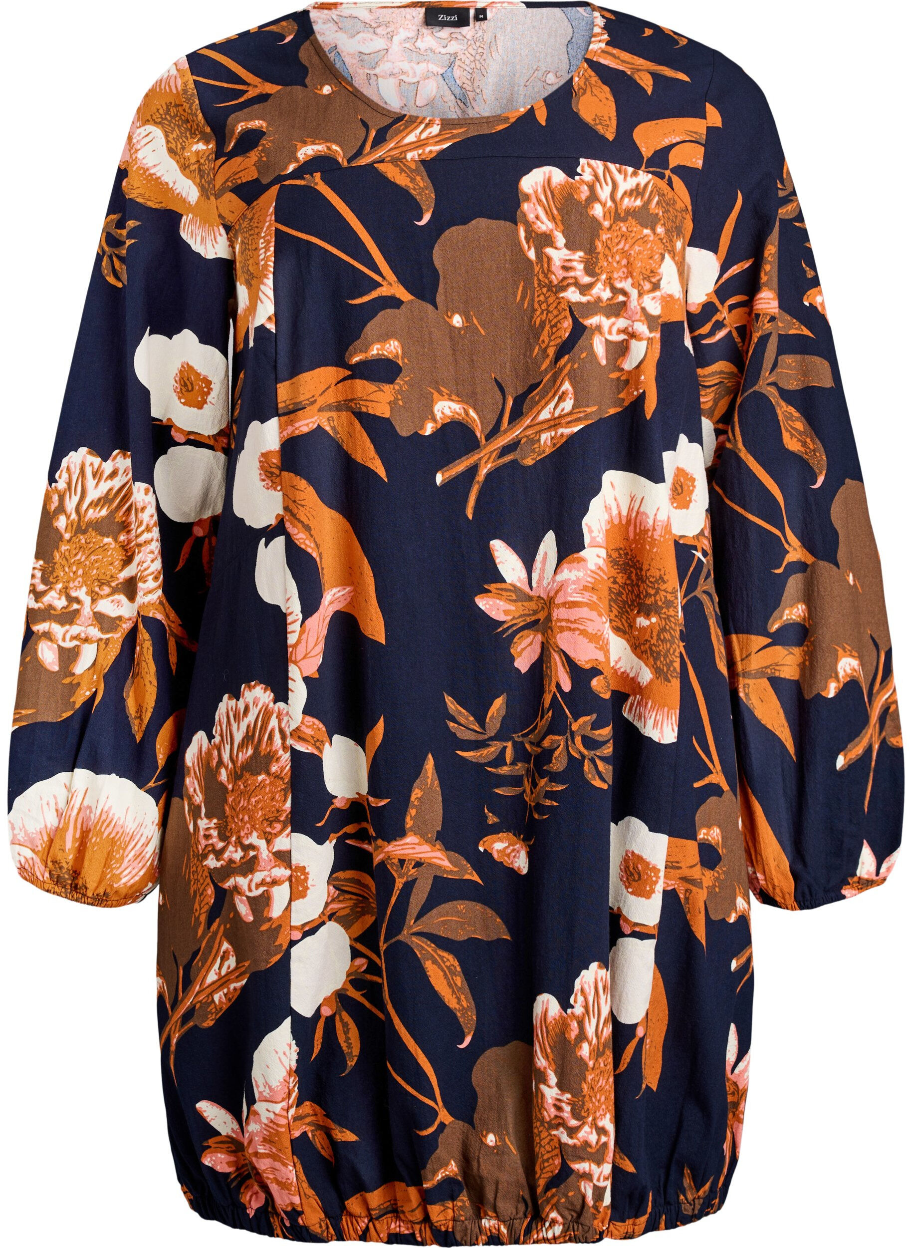 Kort kl&auml;nning i bomull med res&aring;rkant nedtill och l&aring;nga &auml;rmar