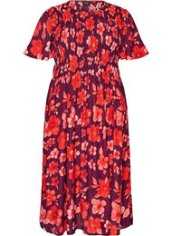 Kl&auml;nning med smock och blommigt m&ouml;nster, Lila