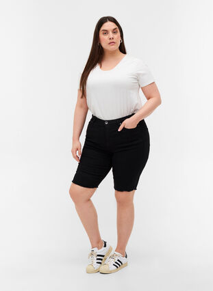 Kroppsnära jeansshorts med råa kanter, Black, Model image number 3
