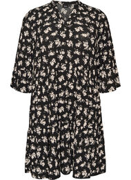 Kort a-linjeformad kl&auml;nning i jersey med helt&auml;ckande m&ouml;nster, Svart