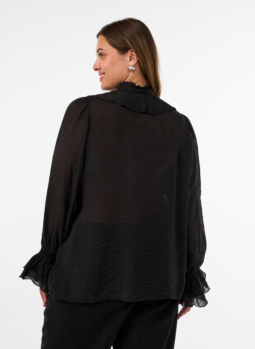 Blus i viskos med volanger och l&aring;nga &auml;rmar, Svart, Model image number 2