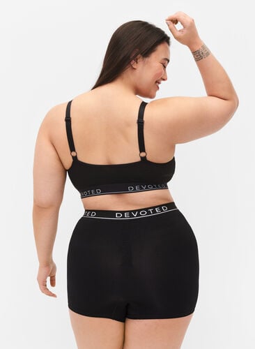 Seamless shortie-trosa med texttryck, Black, Model image number 1