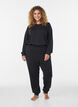 Byxor i jersey med h&ouml;g midja och fickor, Svart, Model image number 0