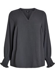 Blus med smockade manschetter och v-ringning, Gr&aring;