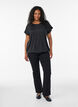 Blus i jersey med texturerade r&auml;nder och smock i nederkanten, Svart, Model image number 1